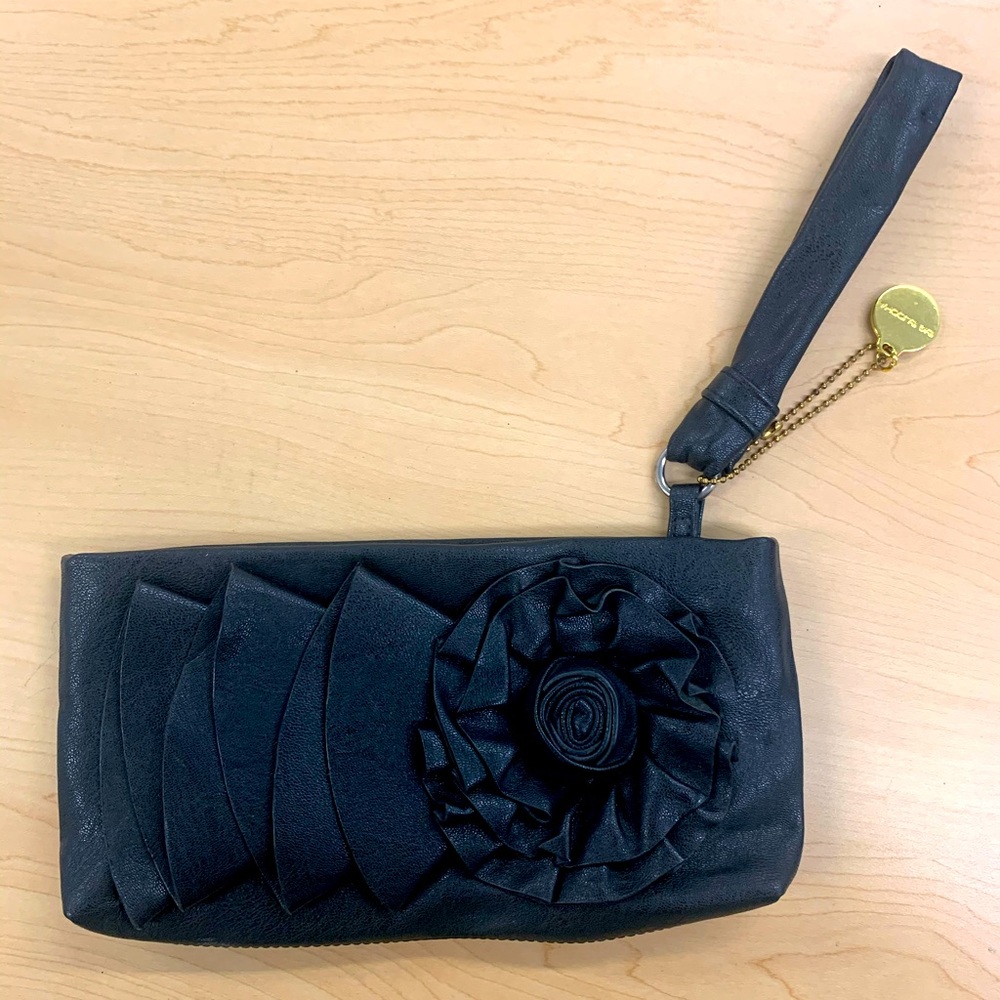 Big Buddha flower detail black pebbled clutch